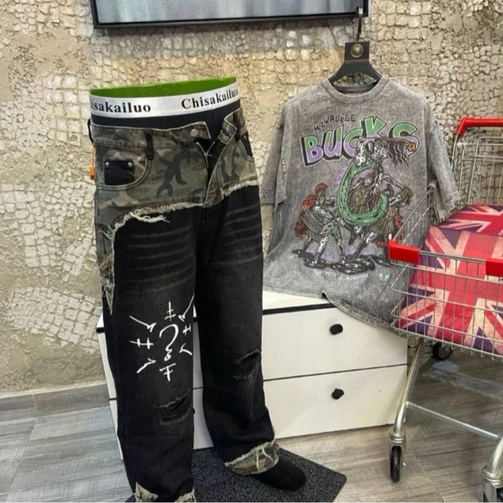 J Brand Camouflage and Black Distressed Jeans